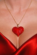 Heart necklace and red satin dress