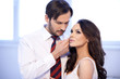 Photo: Tender man stroking his wifes cheek Tender man stroking his wifes cheek