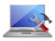 Laptop with hammer and wrench.