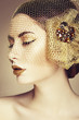 Photo: Beautiful woman face. Perfect makeup Beautiful woman face. Perfect makeup