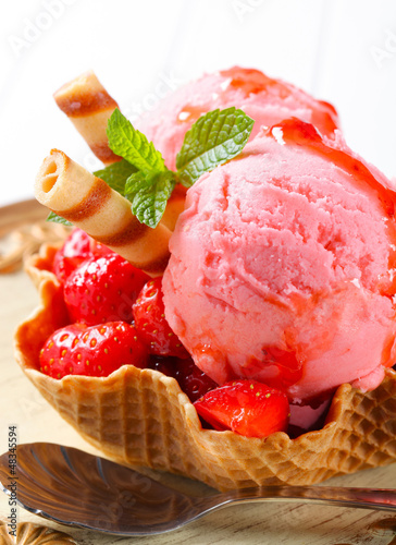 Photo: Ice cream with strawberries in wafer bowl Ice cream with strawberries in wafer bowl