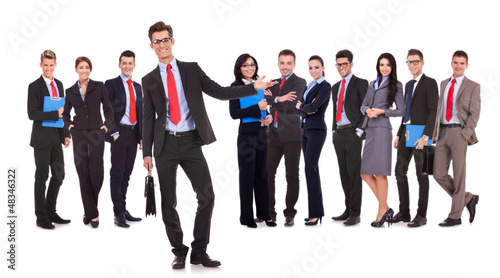 Photo: leader presenting his successful business team leader presenting his successful business team