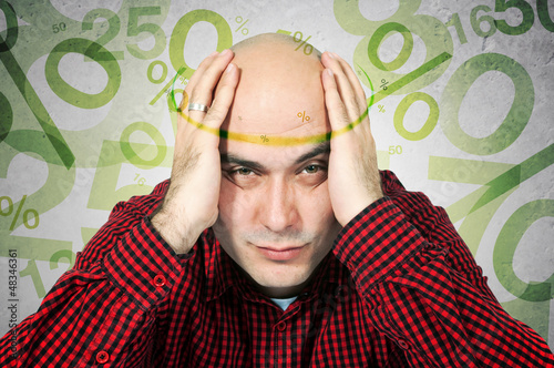Photo: Mortgage headache concept Mortgage headache concept