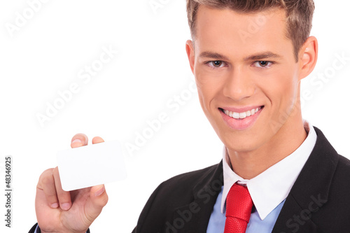 Photo: businessman showing blank business card businessman showing blank business card
