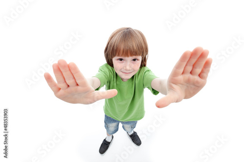 Photo: Little boy showing his palms framing the view Little boy showing his palms framing the view