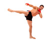 Foto: Young Boxer fighter making a kick over white background Young Boxer fighter making a kick over white background