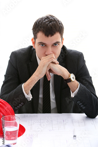 Photo: Young handsome engineer at office Young handsome engineer at office