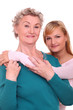 Happy elderly woman with granddaughter