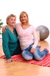 Happy elderly woman with granddaughter