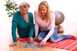 Happy elderly woman with granddaughter