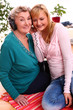 Happy elderly woman with granddaughter