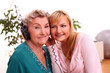 Happy elderly woman with granddaughter