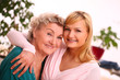 Happy elderly woman with granddaughter