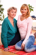 Happy elderly woman with granddaughter