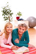 Happy elderly woman with granddaughter