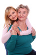 Happy elderly woman with granddaughter