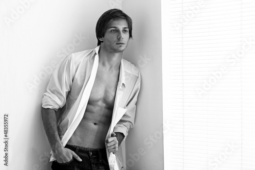 Photo: Young sexual man with naked torso Young sexual man with naked torso
