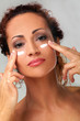 Natural middle aged woman with cream