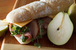 Photo: Ham and cheese sandwich on baguette with poached pears Ham and cheese sandwich on baguette with poached pears