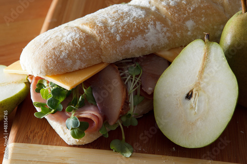 Photo: Ham and cheese sandwich on baguette with poached pears Ham and cheese sandwich on baguette with poached pears