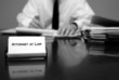 Attorney at Desk with Business Card