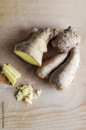 Photo: Ginger Root on Wooden Board Ginger Root on Wooden Board