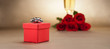 Champagne glasses, present and roses