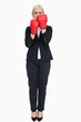 Photo: Blonde businesswoman with red gloves Blonde businesswoman with red gloves