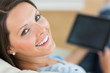 Happy woman using her laptop
