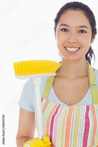 Photo: Smiling woman with broom Smiling woman with broom