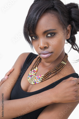 Photo: Woman wearing a necklace Woman wearing a necklace