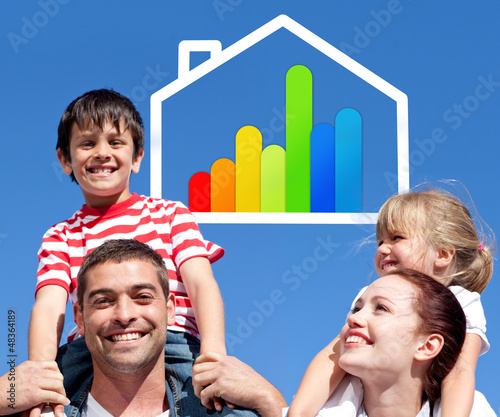 Photo: Smiling parents giving their children piggyback ride Smiling parents giving their children piggyback ride