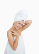 Photo: Portrait of happy woman wrapped in towel Portrait of happy woman wrapped in towel