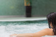 Photo: Woman relaxing in jacuzzi Woman relaxing in jacuzzi