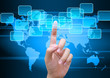 Foto: hand pushing button on a touch screen interface hand pushing button on a touch screen interface