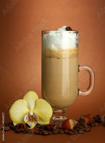 Photo: Fragrant coffee latte in glass cup with spices, Fragrant coffee latte in glass cup with spices,