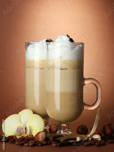 Photo: Fragrant coffee latte in glasses cups with spices, Fragrant coffee latte in glasses cups with spices,