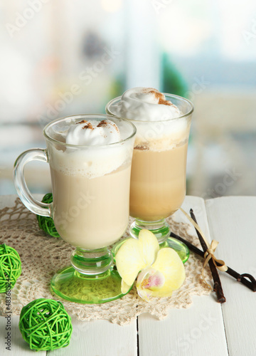 Photo: Fragrant coffee latte in glasses cups with spices, Fragrant coffee latte in glasses cups with spices,