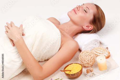 Photo: woman in spa receiving treatment woman in spa receiving treatment