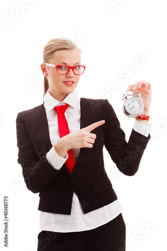Photo: woman holding alarm clock woman holding alarm clock