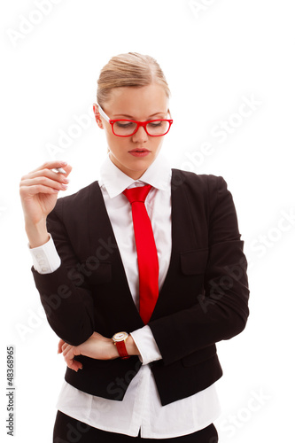 Photo: seriously businesswoman holding pen seriously businesswoman holding pen