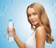 young beautiful woman with  bottle of water