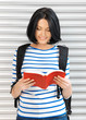 woman with bag and book