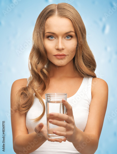 Photo: woman hands holding glass of water woman hands holding glass of water