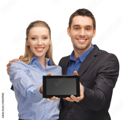 Photo: man and woman with tablet pc man and woman with tablet pc