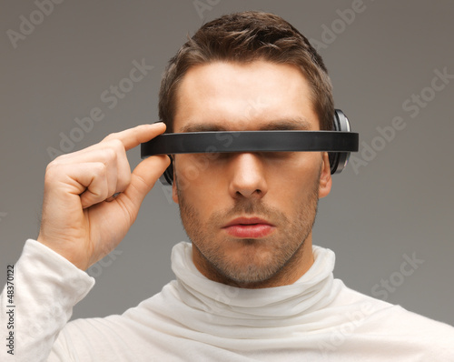 Photo: man with futuristic glasses man with futuristic glasses