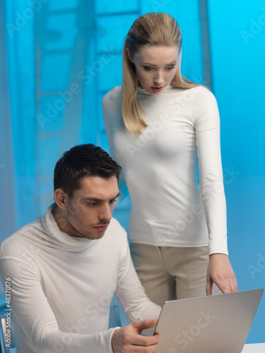 Photo: man and woman in laboratory man and woman in laboratory