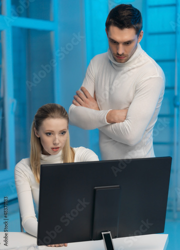 Photo: man and woman in laboratory man and woman in laboratory