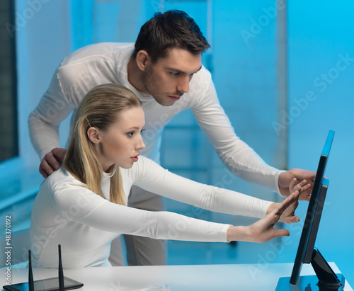 Photo: man and woman in laboratory man and woman in laboratory
