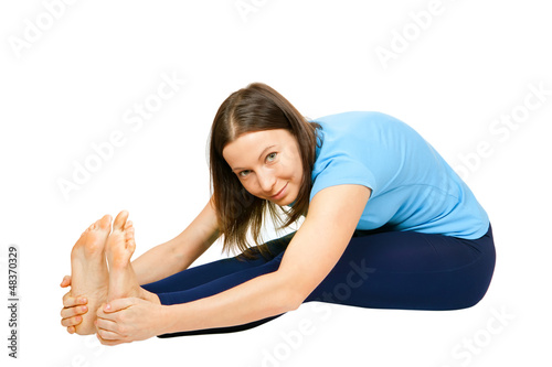 Photo: exercising woman isolated on white exercising woman isolated on white